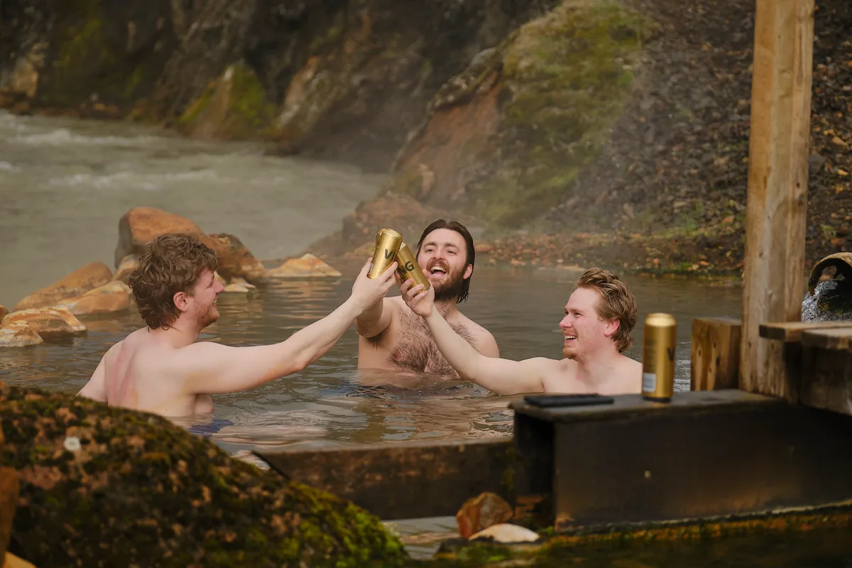 Three people relaxing in the Kerlingarfjöll hot spring on Day 1