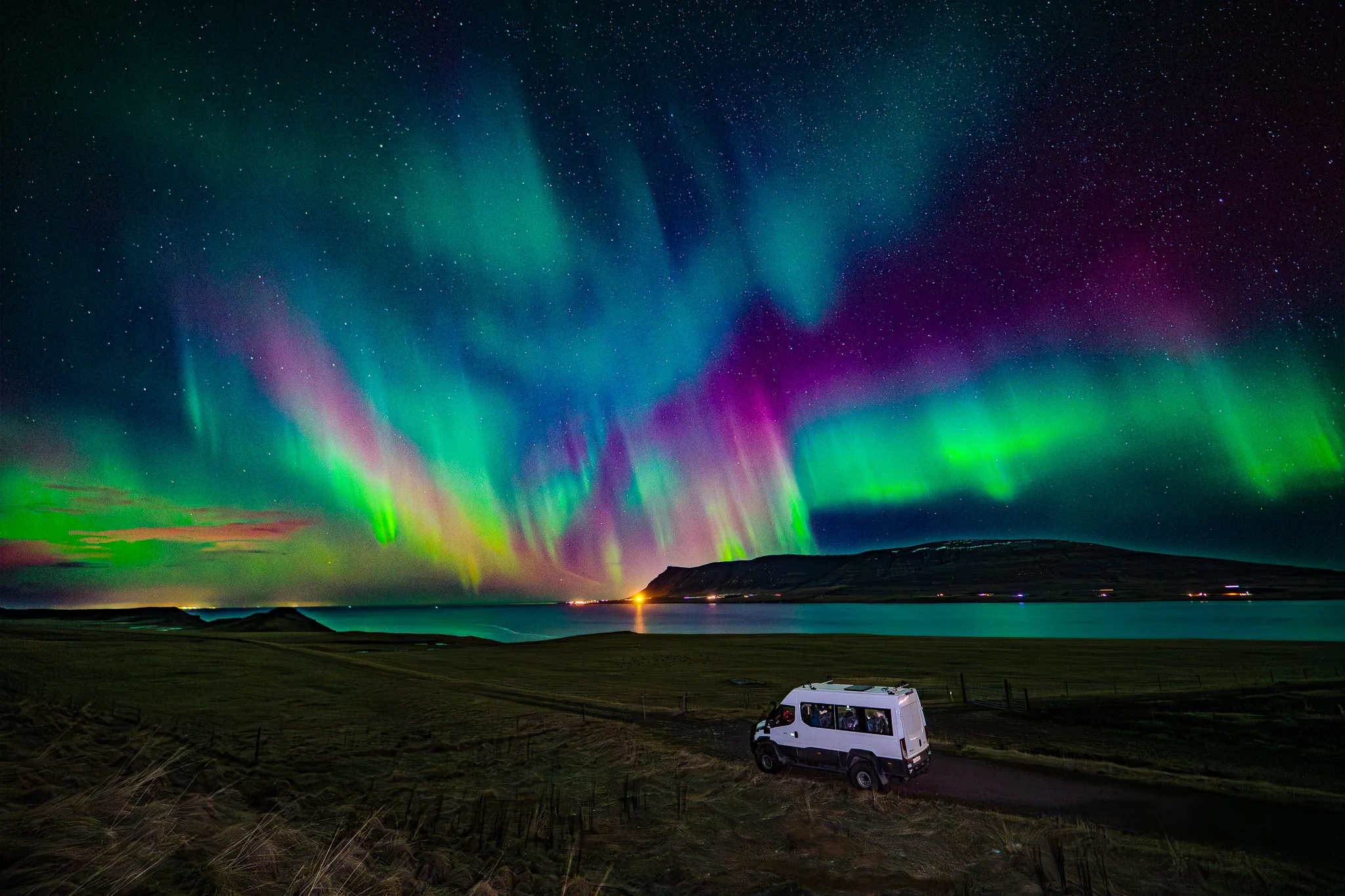 Northern lights over Icelandic winter landscape