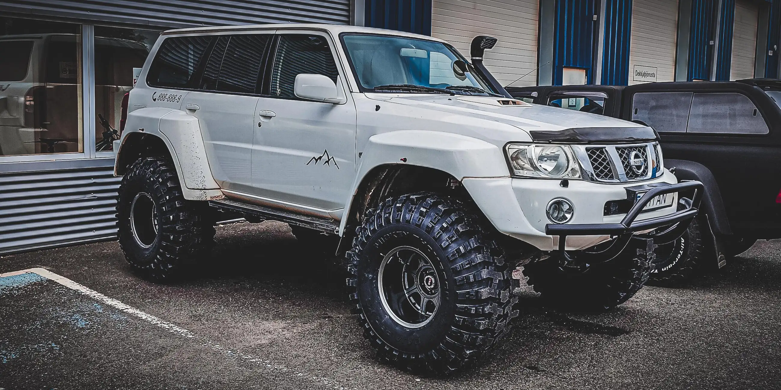 Close view of the Norse Adventures Nissan Patrol Superjeep with 44-inch tires